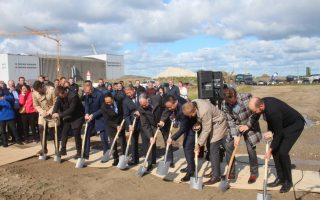 A group of people posing for the camera Description automatically generated